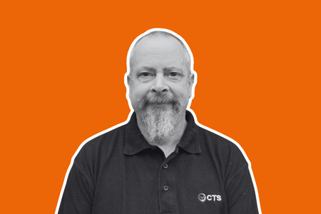 JON RANDALL HEADHSOT ORANGE BACKGROUND