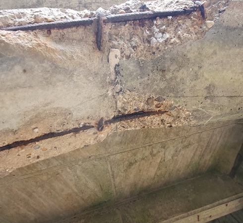 Concrete showing signs of carbonation deterioration