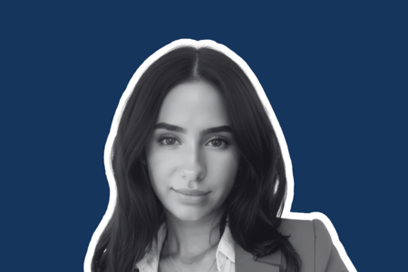 Headshot of Ruby Gartland on blue background