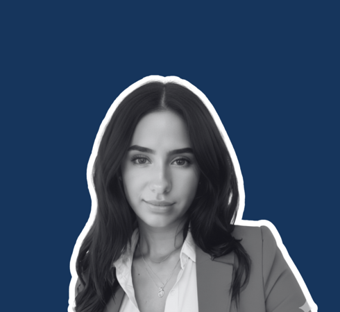 Headshot of Ruby Gartland on blue background