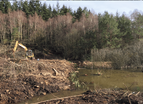 Dredging contaminated land