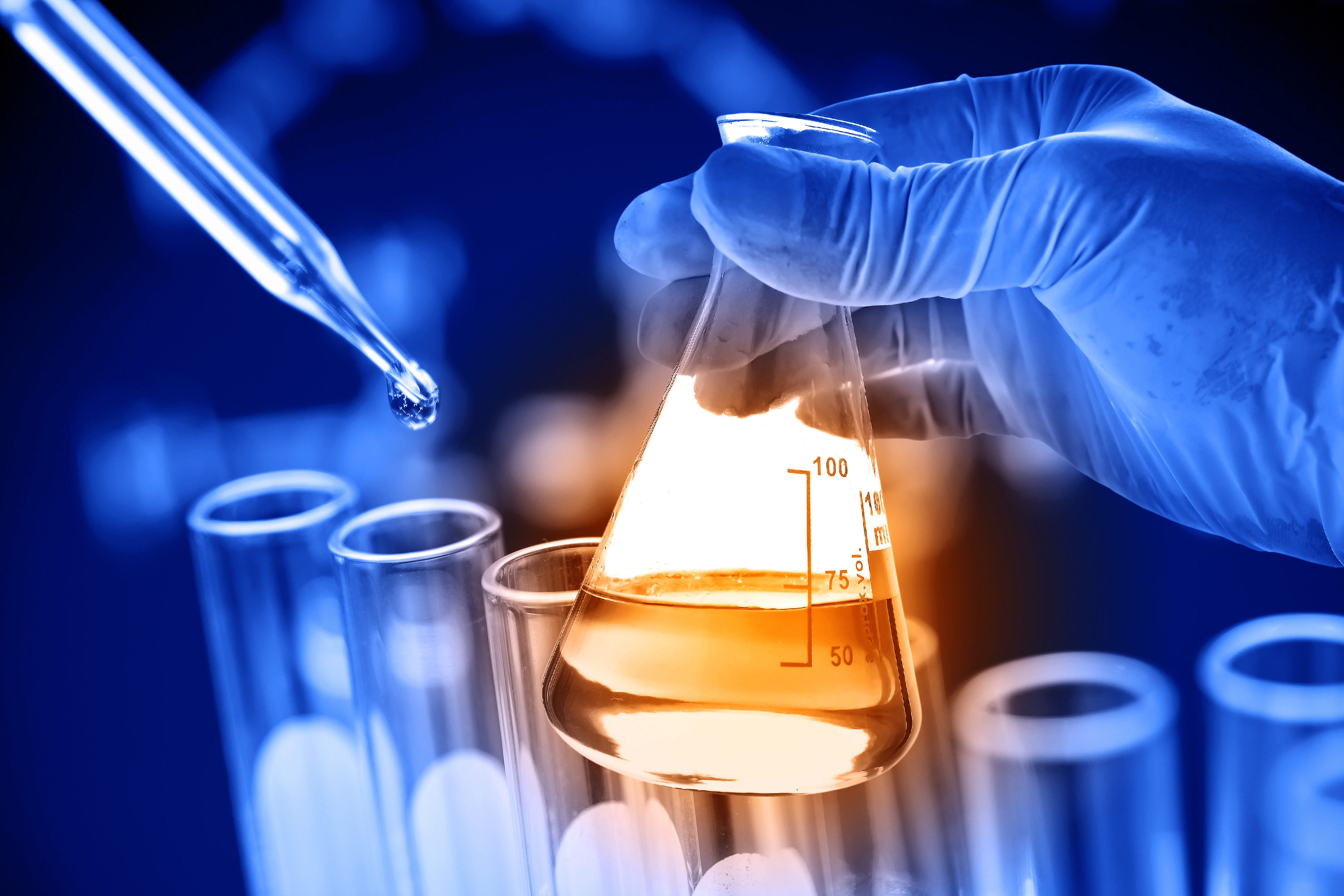 Chemist holding a flask